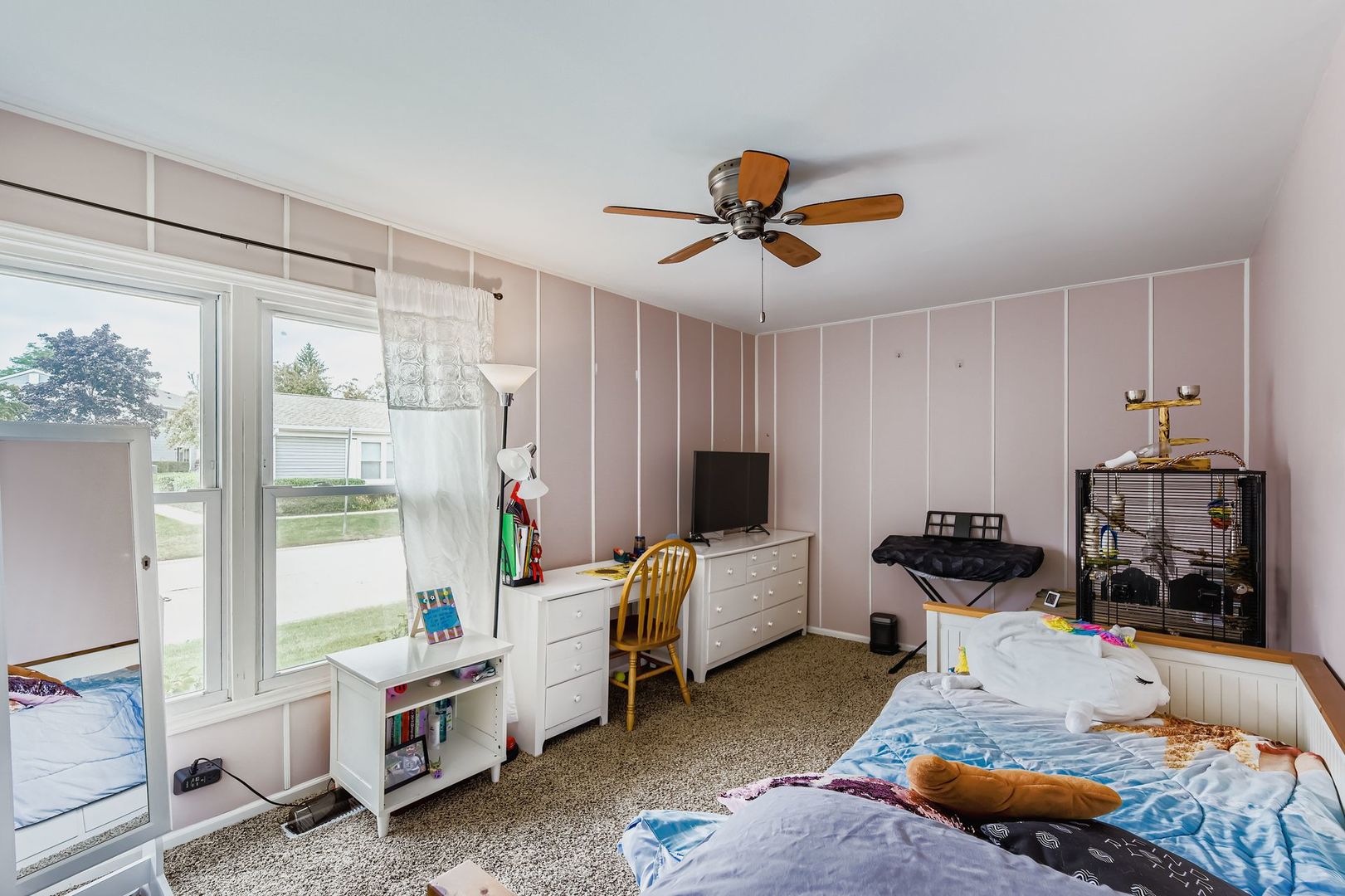 1078 Newport Harbor, Unit 1078 Schaumburg, IL 60193 - Photo 6 of 13 a bedroom with furniture and a window