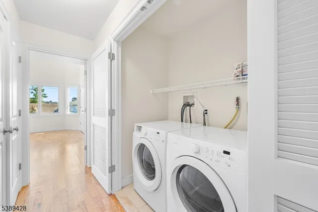a view of washer and dryer in a utility room