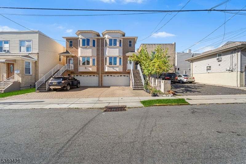 233 5th Street, Unit B Fairview, NJ 07022 - Photo 2 of 31 a view of a house with a patio