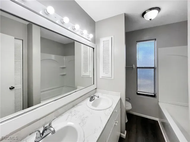 a bathroom with a sink and a bathtub
