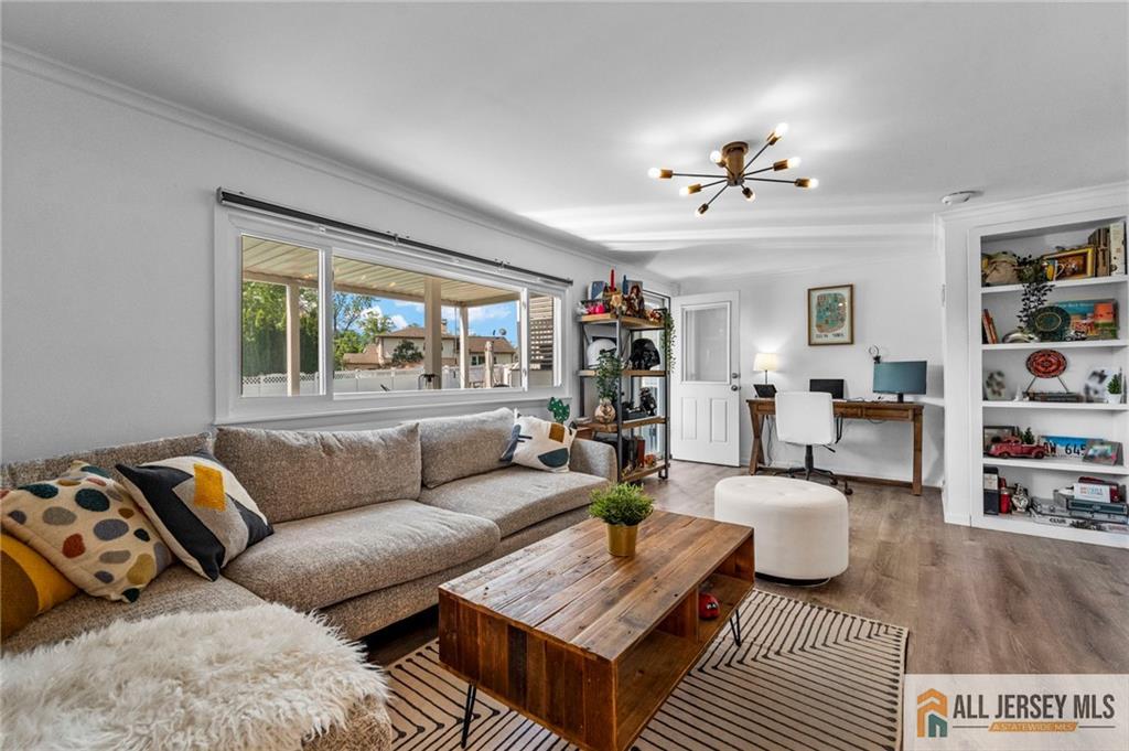 21 Starlight Drive Colonia, NJ 07067 - Photo 4 of 41 a living room with furniture and a large window