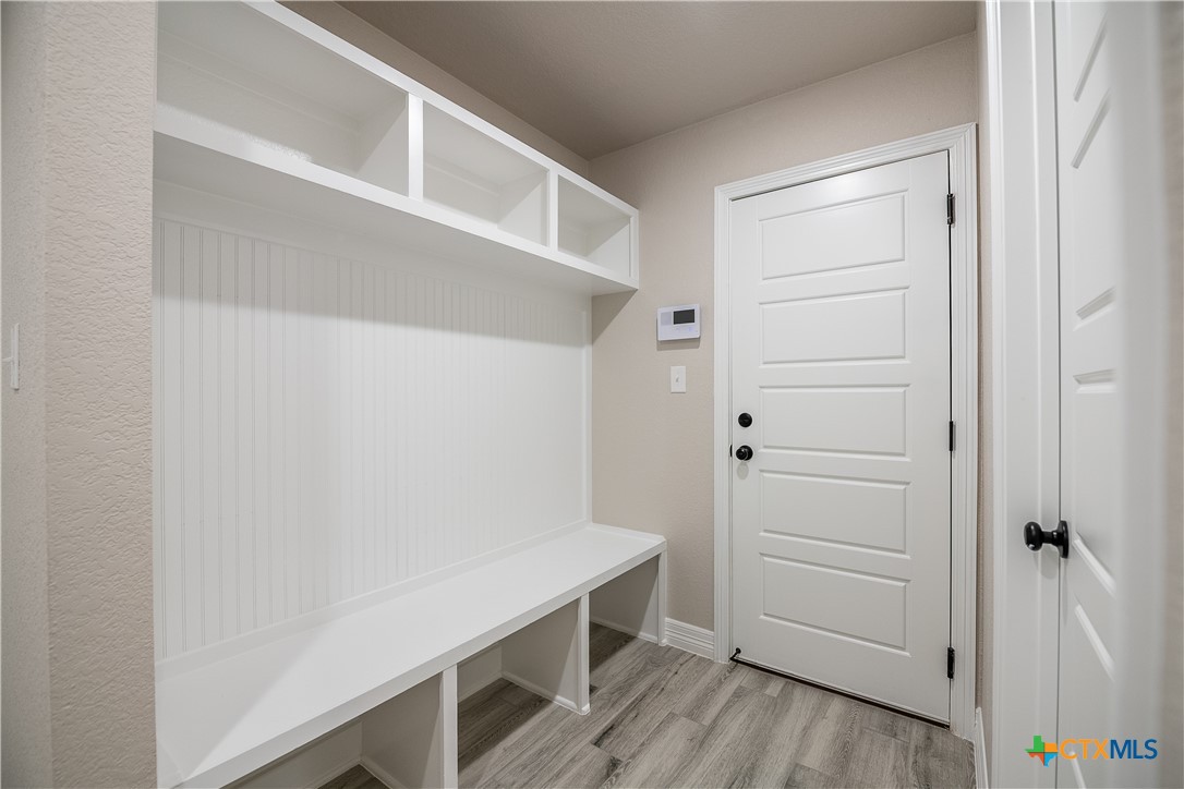 1404 Red Rock Road Hewitt, TX 76643 - Photo 19 of 30 a view of an empty walk in closet