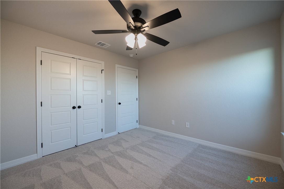 1404 Red Rock Road Hewitt, TX 76643 - Photo 23 of 30 wooden floor in an empty room