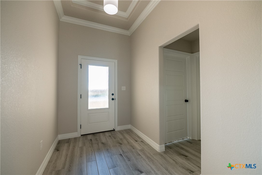 1404 Red Rock Road Hewitt, TX 76643 - Photo 3 of 30 a view of an empty room with closet and a window