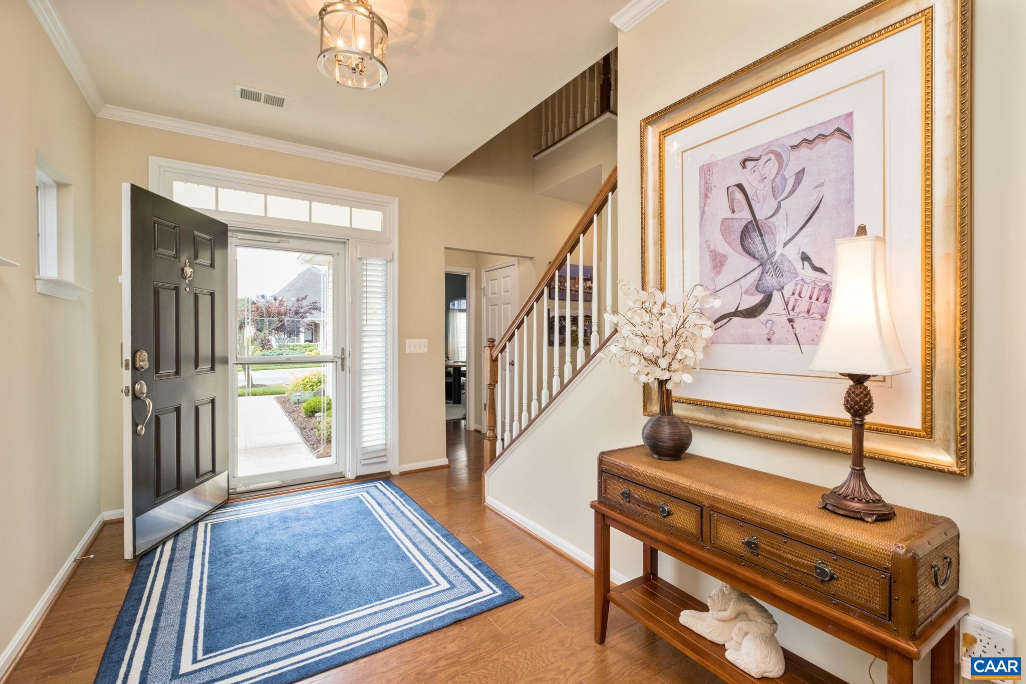 56 John Rucker Drive Ruckersville, VA 22968 - Photo 22 of 38 a view of staircase with a rug and a window