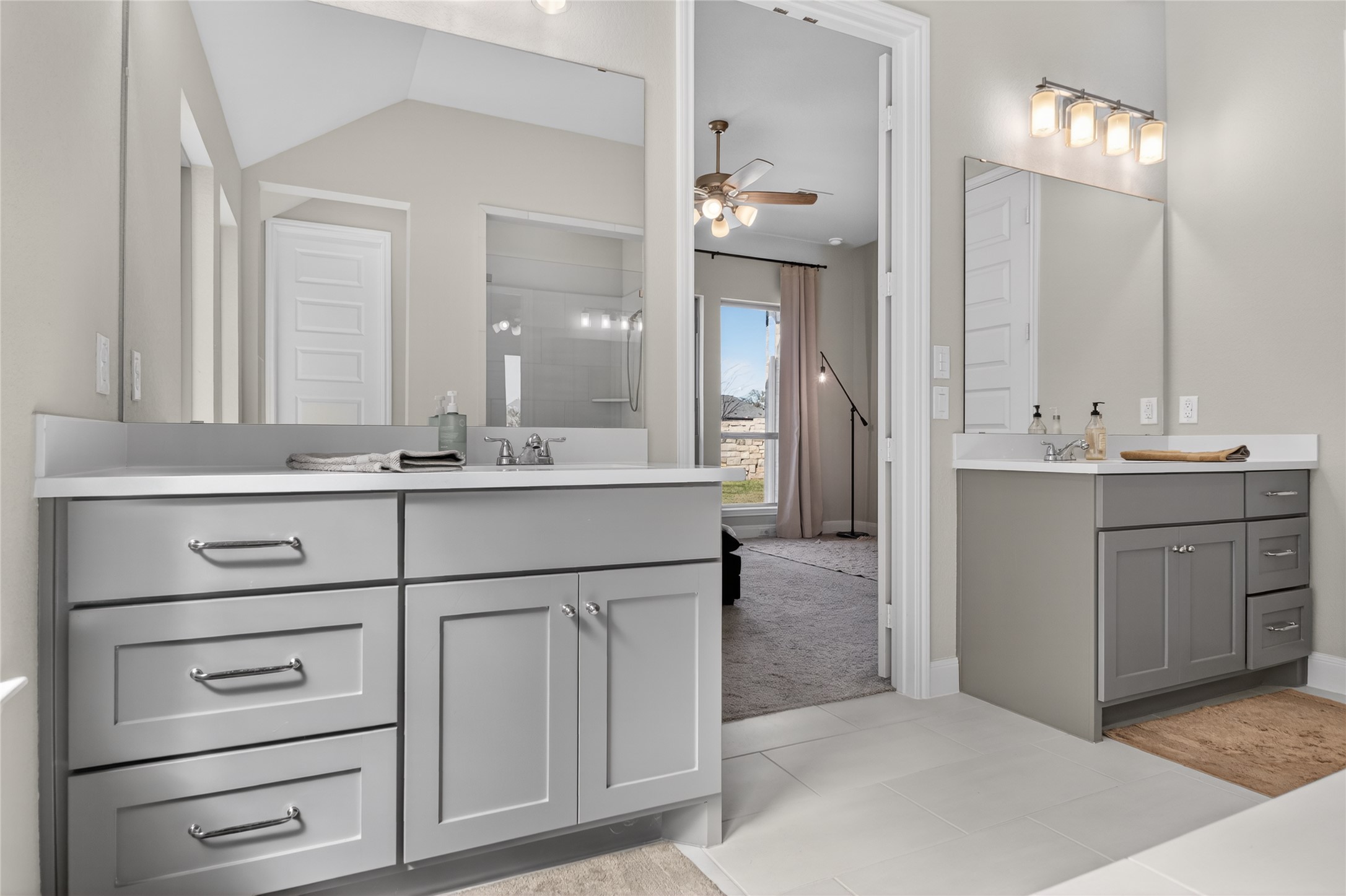 100 Peach Orch Lane Georgetown, TX 78628 - Photo 18 of 40 a bathroom with a sink vanity and a mirror