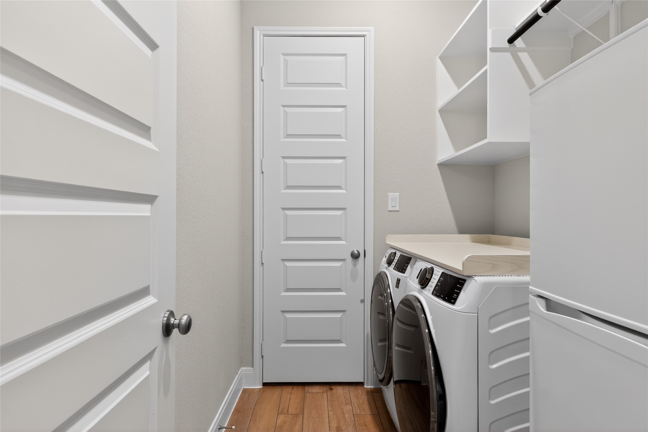 100 Peach Orch Lane Georgetown, TX 78628 - Photo 25 of 40 a view of walk in closet with clothes and shoes