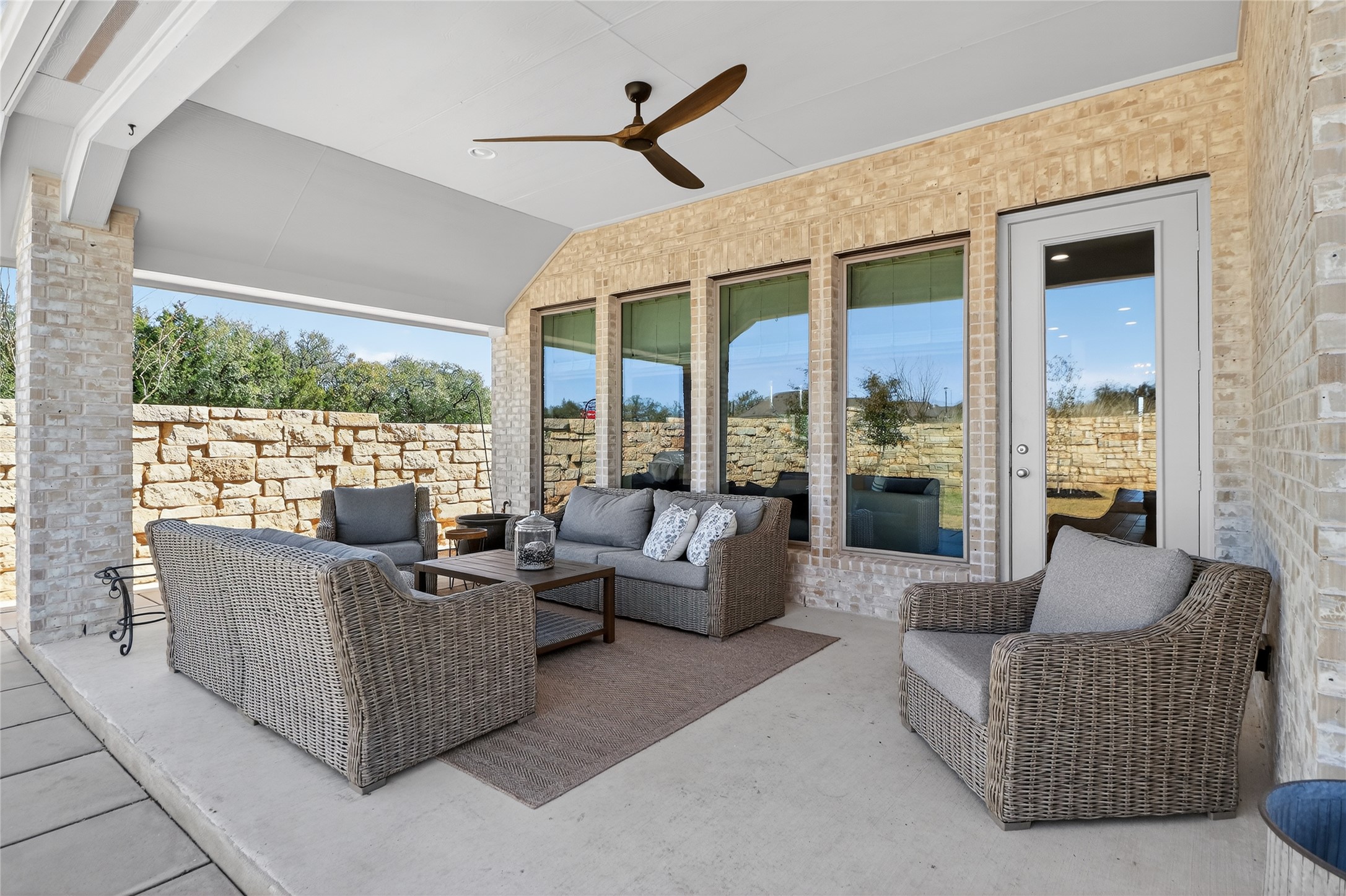 100 Peach Orch Lane Georgetown, TX 78628 - Photo 26 of 40 a living room with furniture and floor to ceiling windows