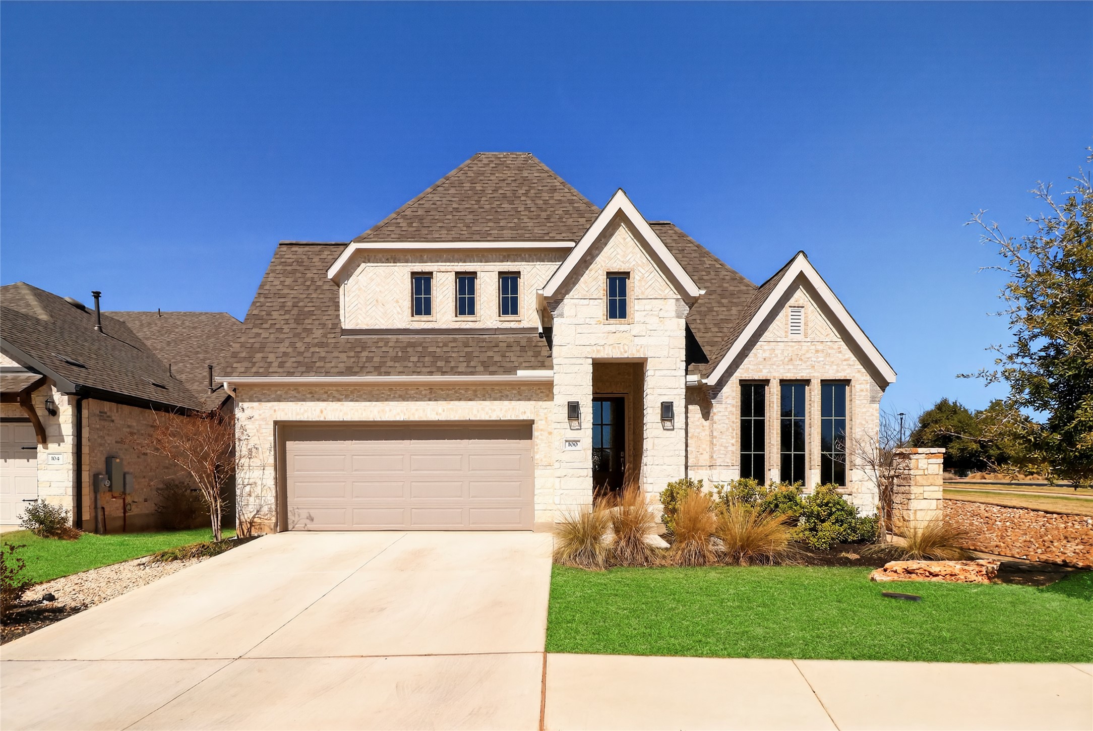 100 Peach Orch Lane Georgetown, TX 78628 - Photo 31 of 40 a front view of a house with a yard