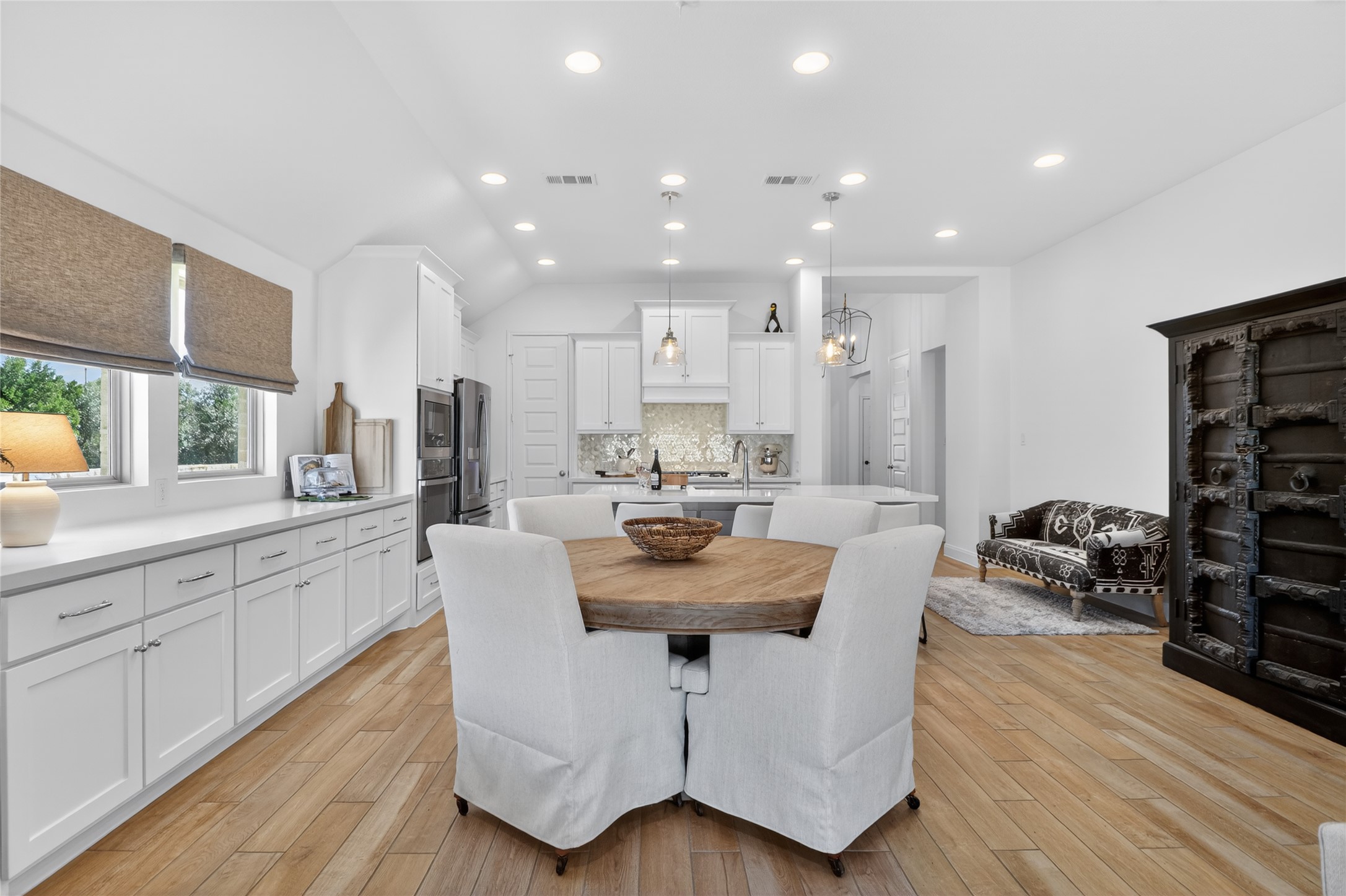 100 Peach Orch Lane Georgetown, TX 78628 - Photo 8 of 40 a view of kitchen with sink and living room