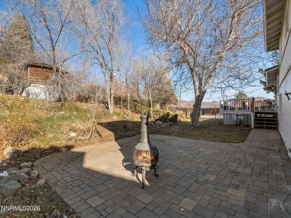 a fire hydrant in middle of a yard