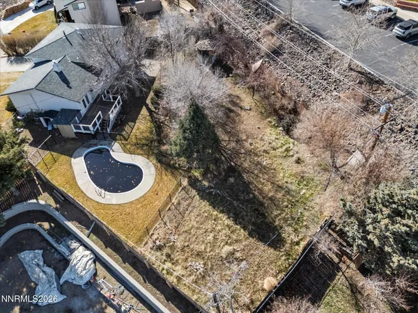 a view of a house with swimming pool