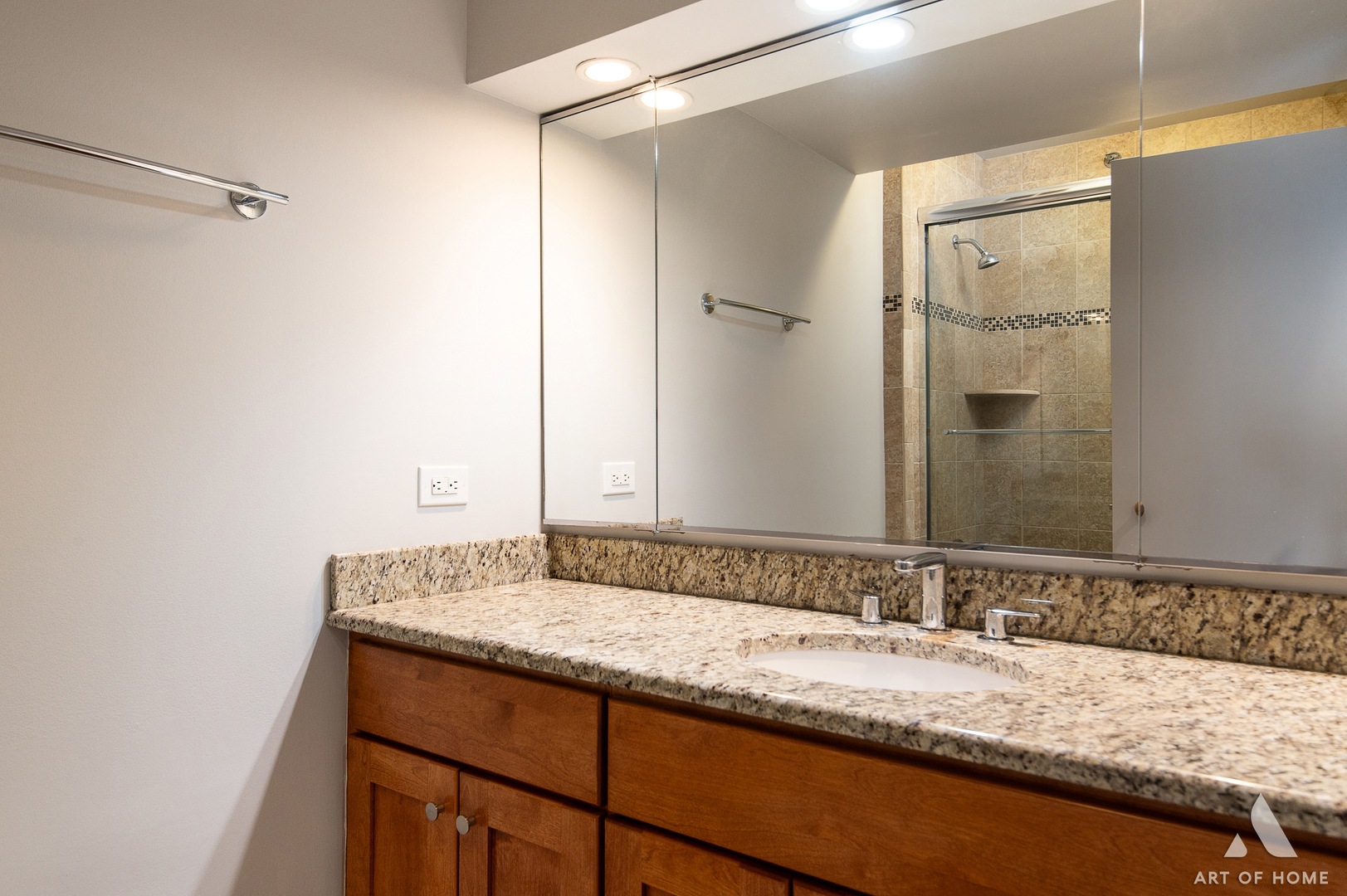 400 East Ohio Street, Unit 2302 Chicago, IL 60611 - Photo 20 of 38 a bathroom with a granite countertop sink and a mirror