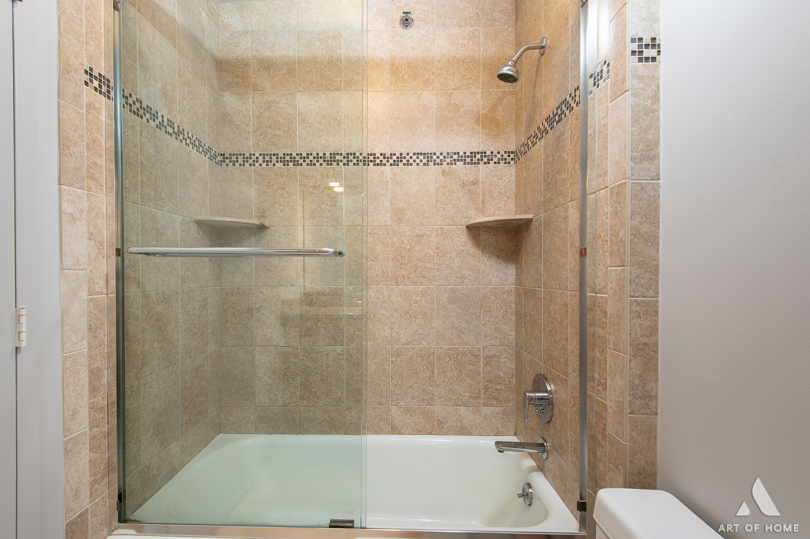 400 East Ohio Street, Unit 2302 Chicago, IL 60611 - Photo 21 of 38 a bathroom with a shower and a toilet