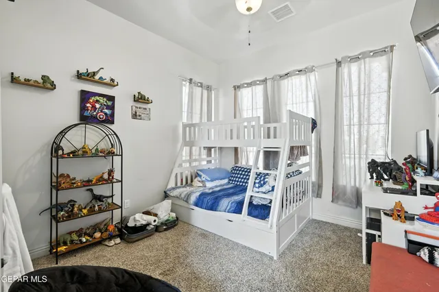 a room with furniture and a large window