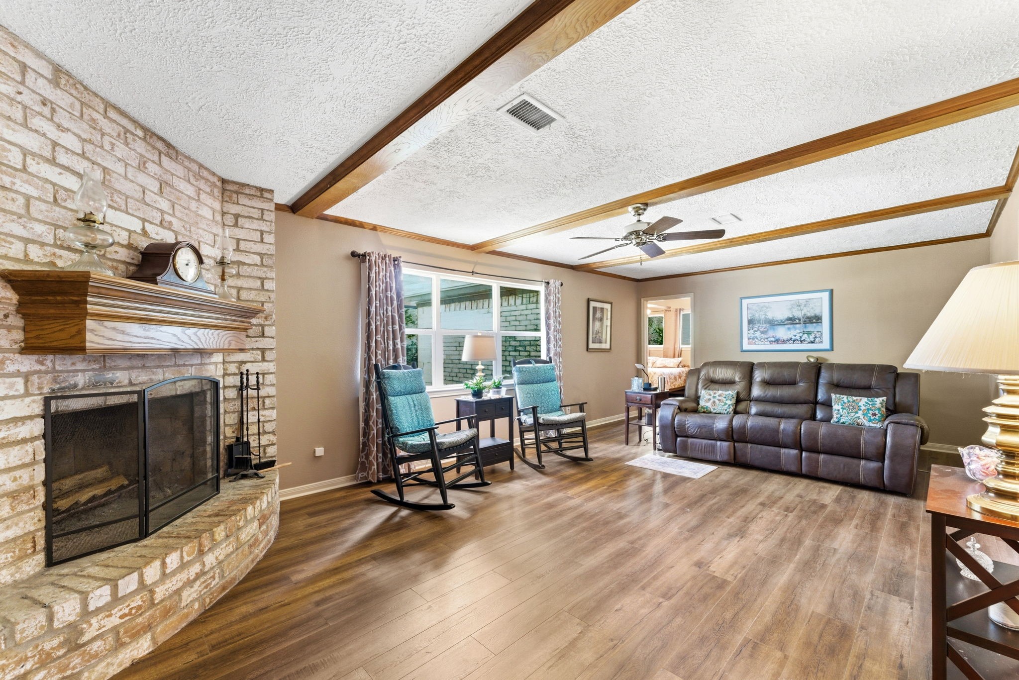 2354 Hickory Hollow Lane Spring, TX 77386 - Photo 3 of 11 a living room with furniture and a fireplace