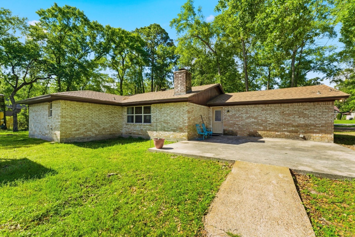 2354 Hickory Hollow Lane Spring, TX 77386 - Photo 10 of 11 a front view of a house with a garden