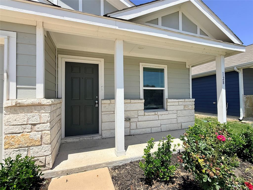 128 Honeysuckle Street Princeton, TX 75407 - Photo 2 of 19 covered front porch