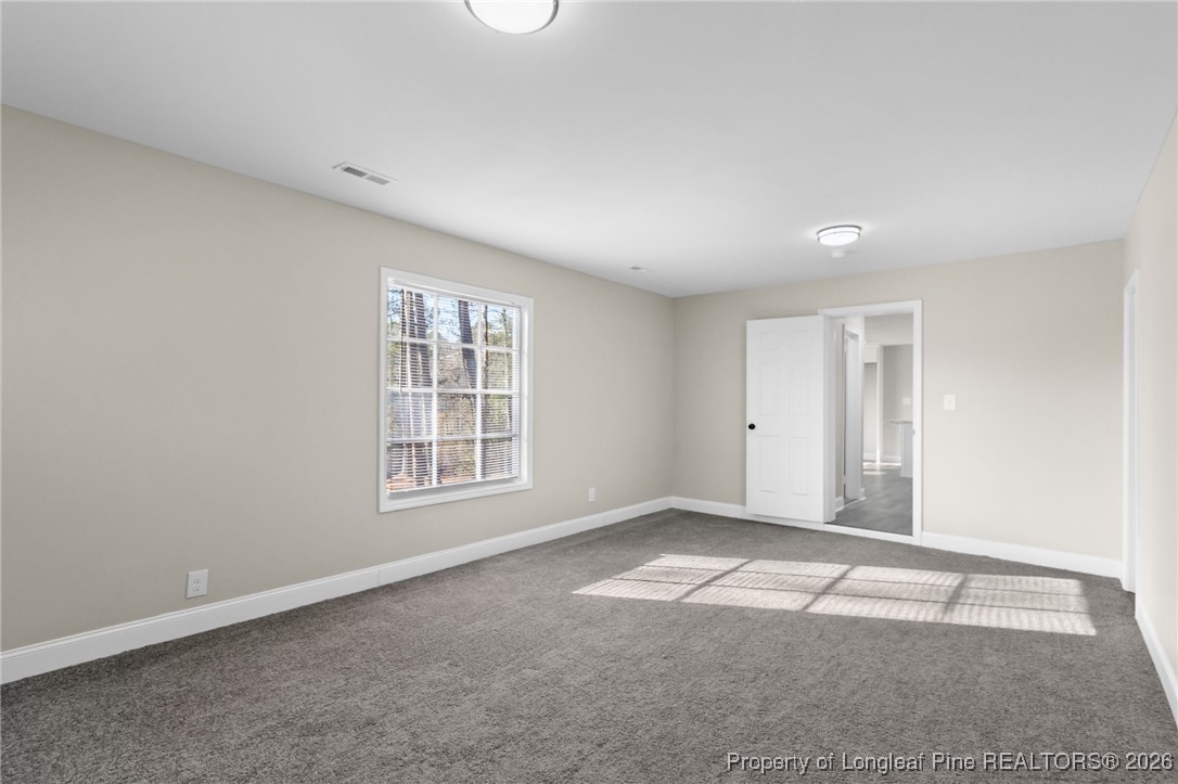 2712 Morganton Road Fayetteville, NC 28303 - Photo 14 of 39 a view of an empty room with a window