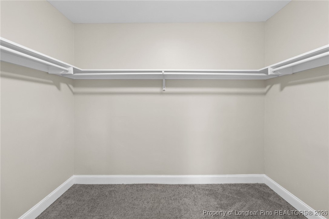 2712 Morganton Road Fayetteville, NC 28303 - Photo 16 of 39 a view of an empty walk in closet