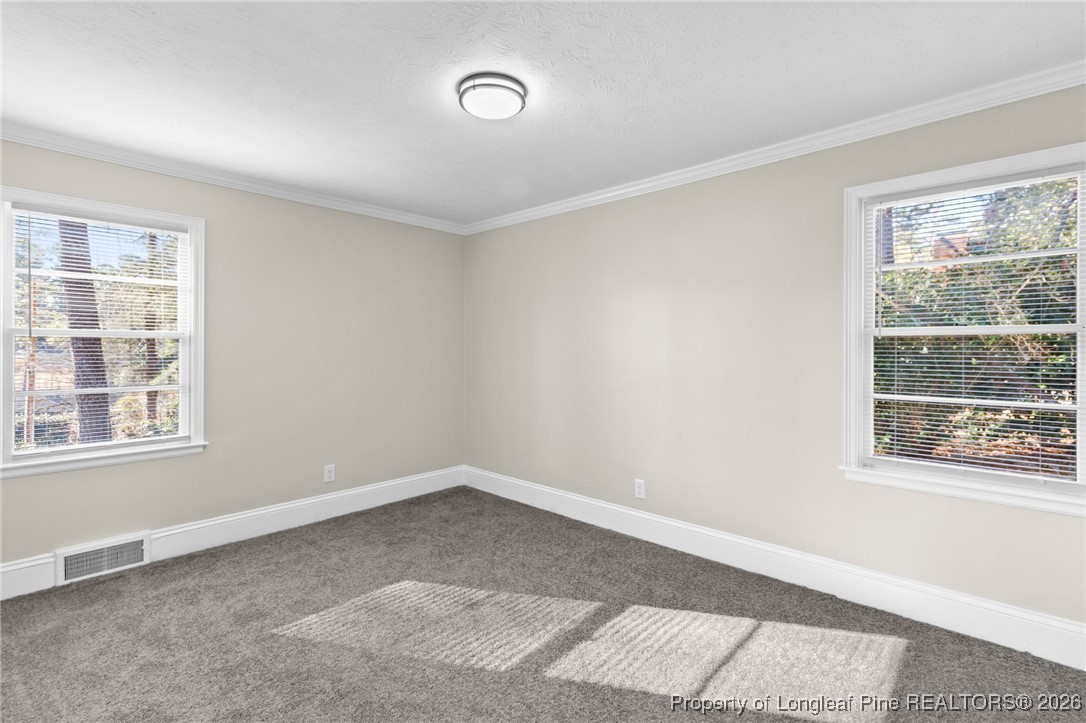2712 Morganton Road Fayetteville, NC 28303 - Photo 24 of 39 an empty room with a window