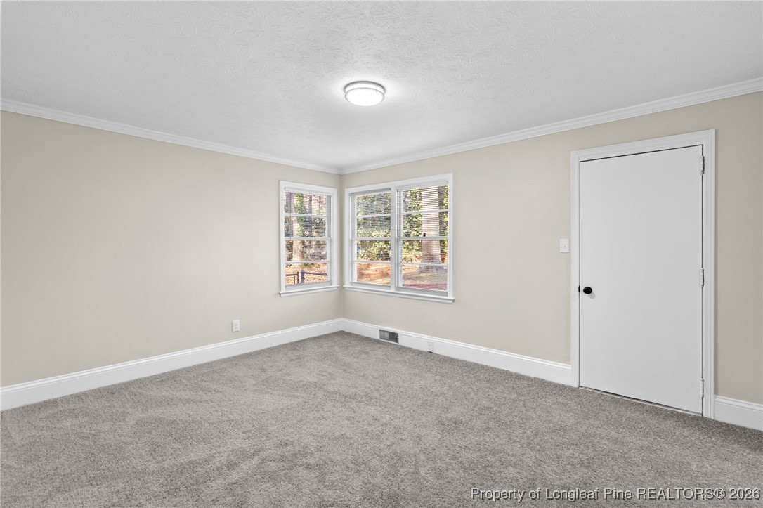 2712 Morganton Road Fayetteville, NC 28303 - Photo 25 of 39 a view of an empty room with a window