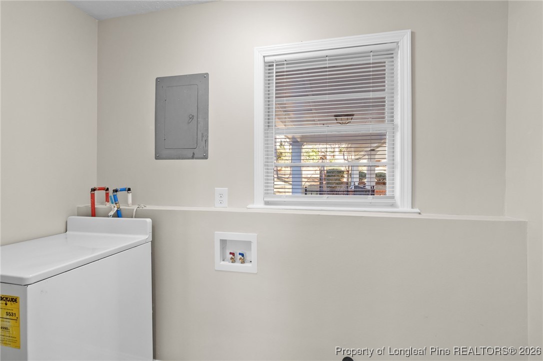 2712 Morganton Road Fayetteville, NC 28303 - Photo 27 of 39 a utility room with dryer and washer