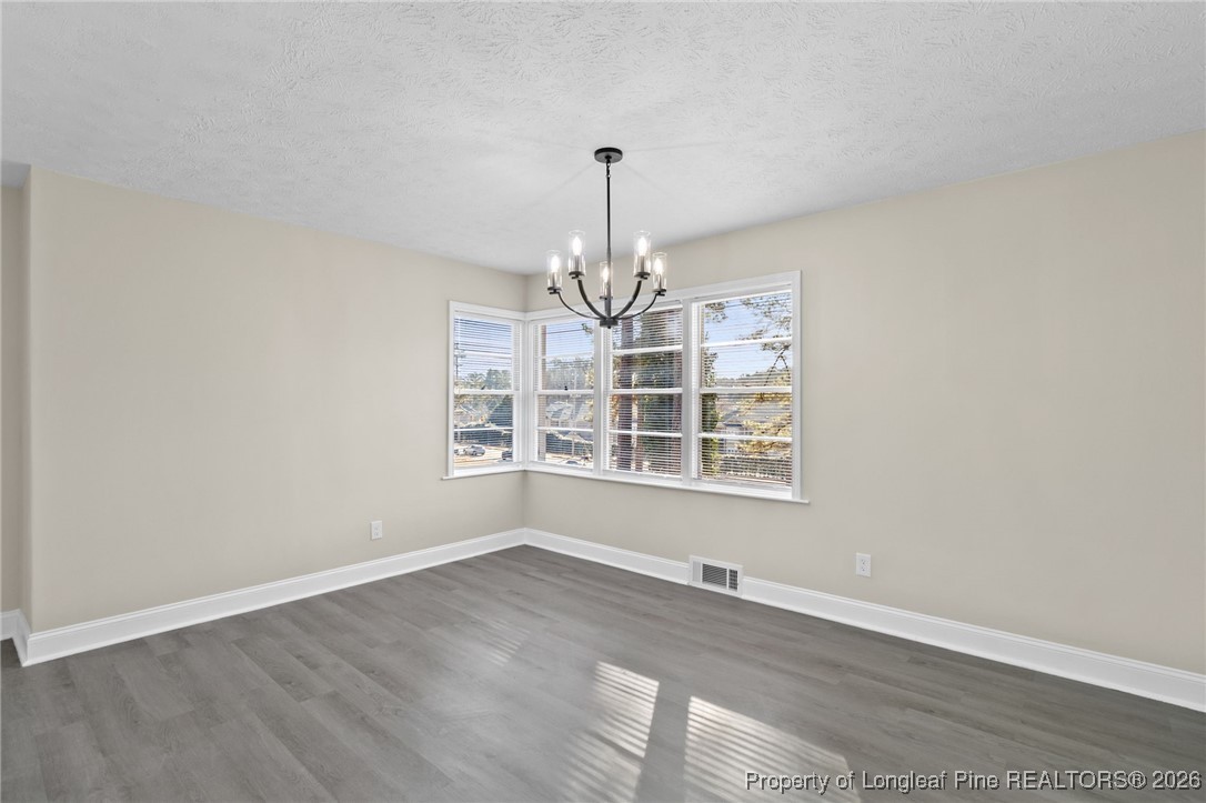 2712 Morganton Road Fayetteville, NC 28303 - Photo 7 of 39 a view of an empty room with a window