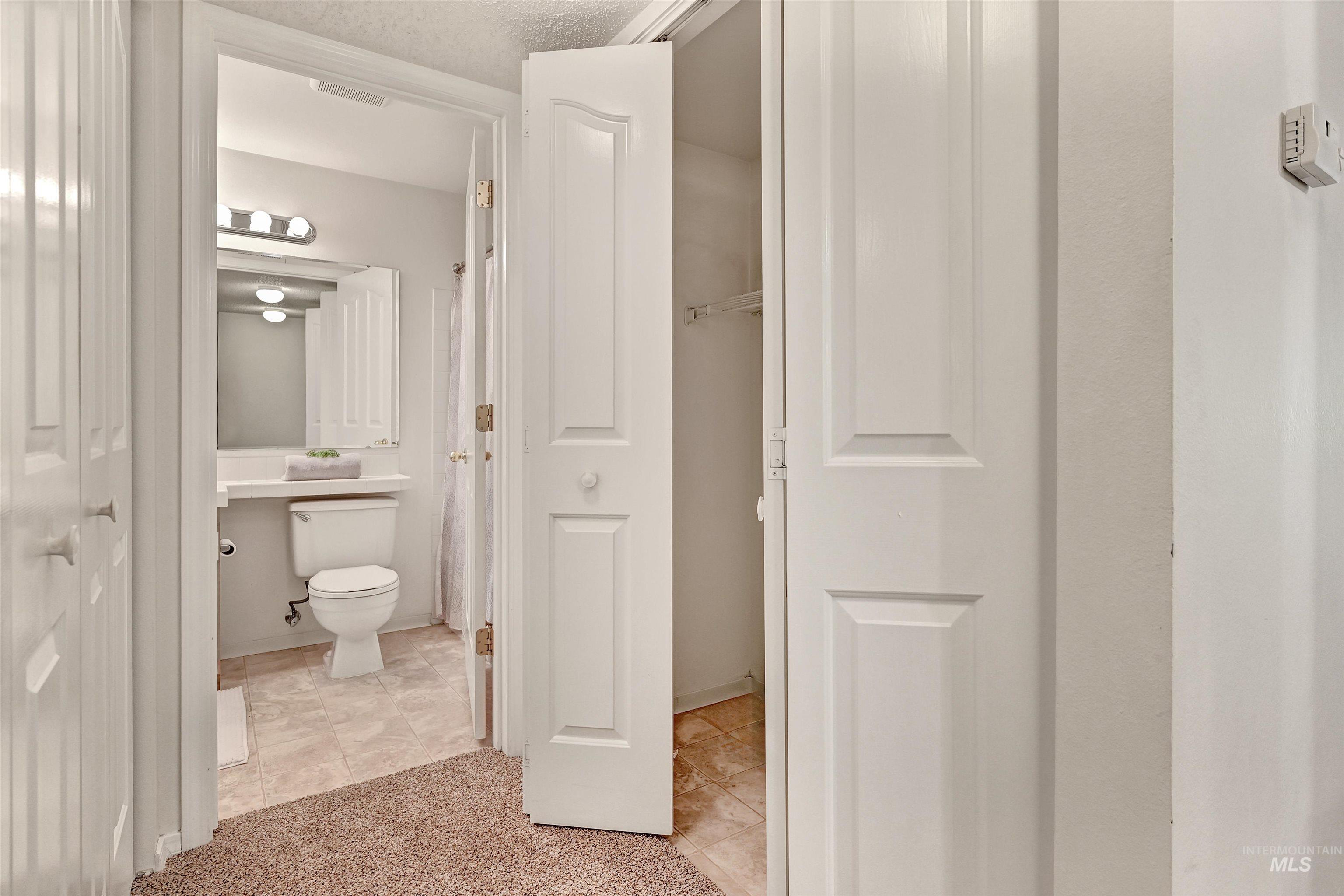 3695 South Gekeler Lane, Unit 18 Boise, ID 83706 - Photo 16 of 33 Bathroom and closet for in unit washer and dryer.