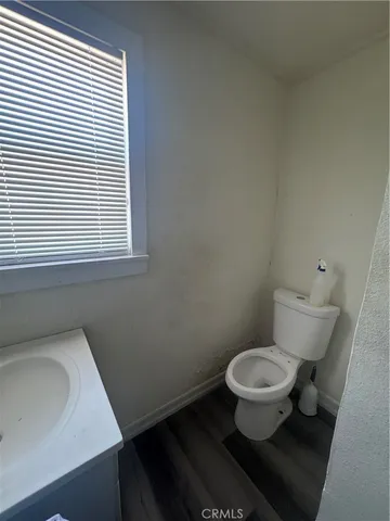 a bathroom with a toilet and a sink