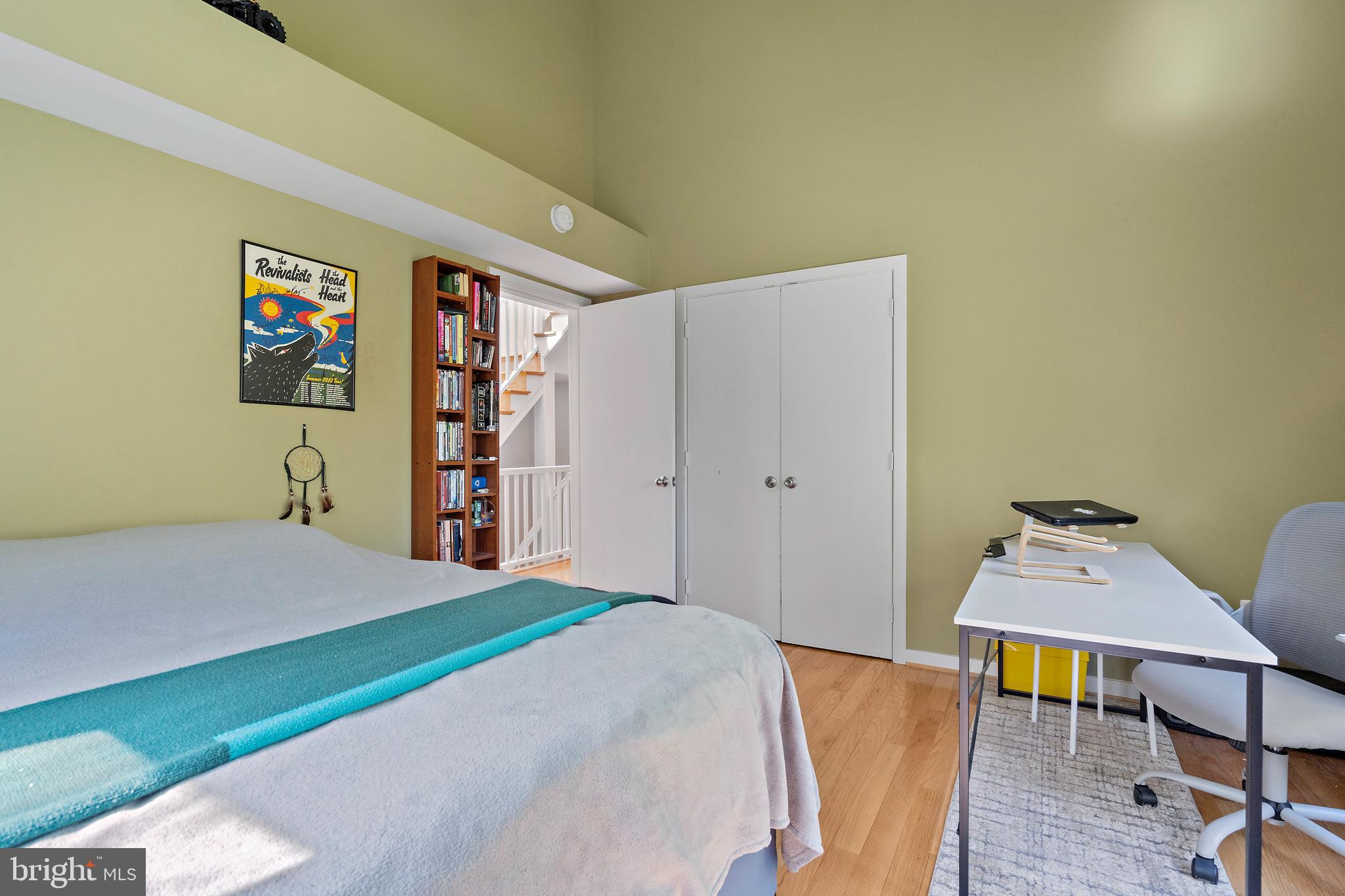 132 Hilltop Road Silver Spring, MD 20910 - Photo 16 of 50 a bed room with a bed and a couch