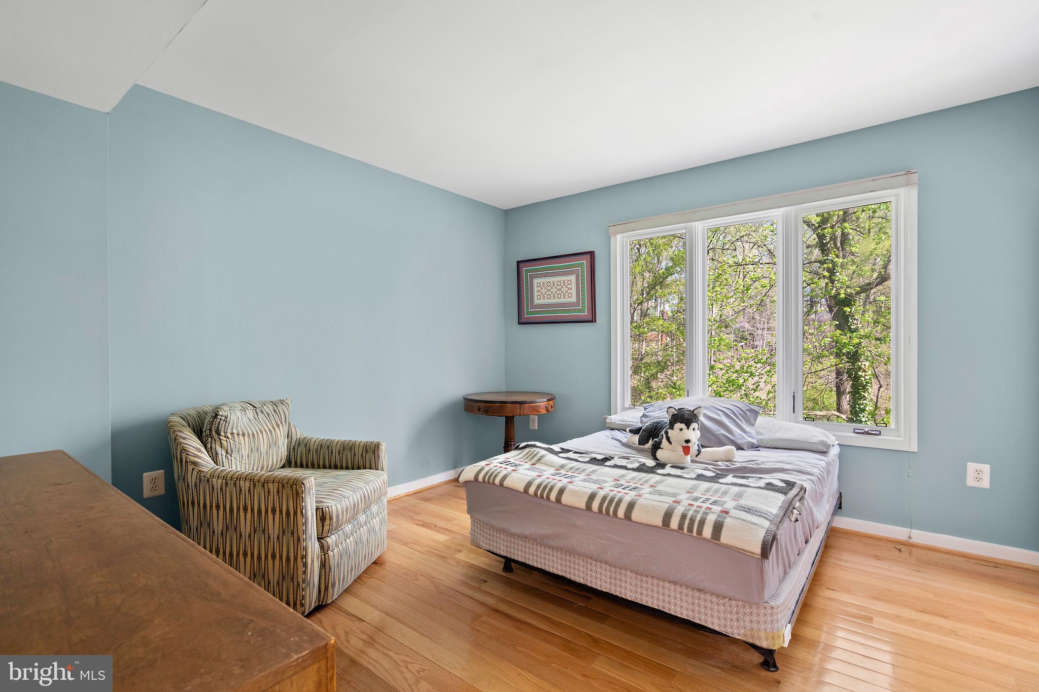 132 Hilltop Road Silver Spring, MD 20910 - Photo 18 of 50 a bedroom with a bed and window