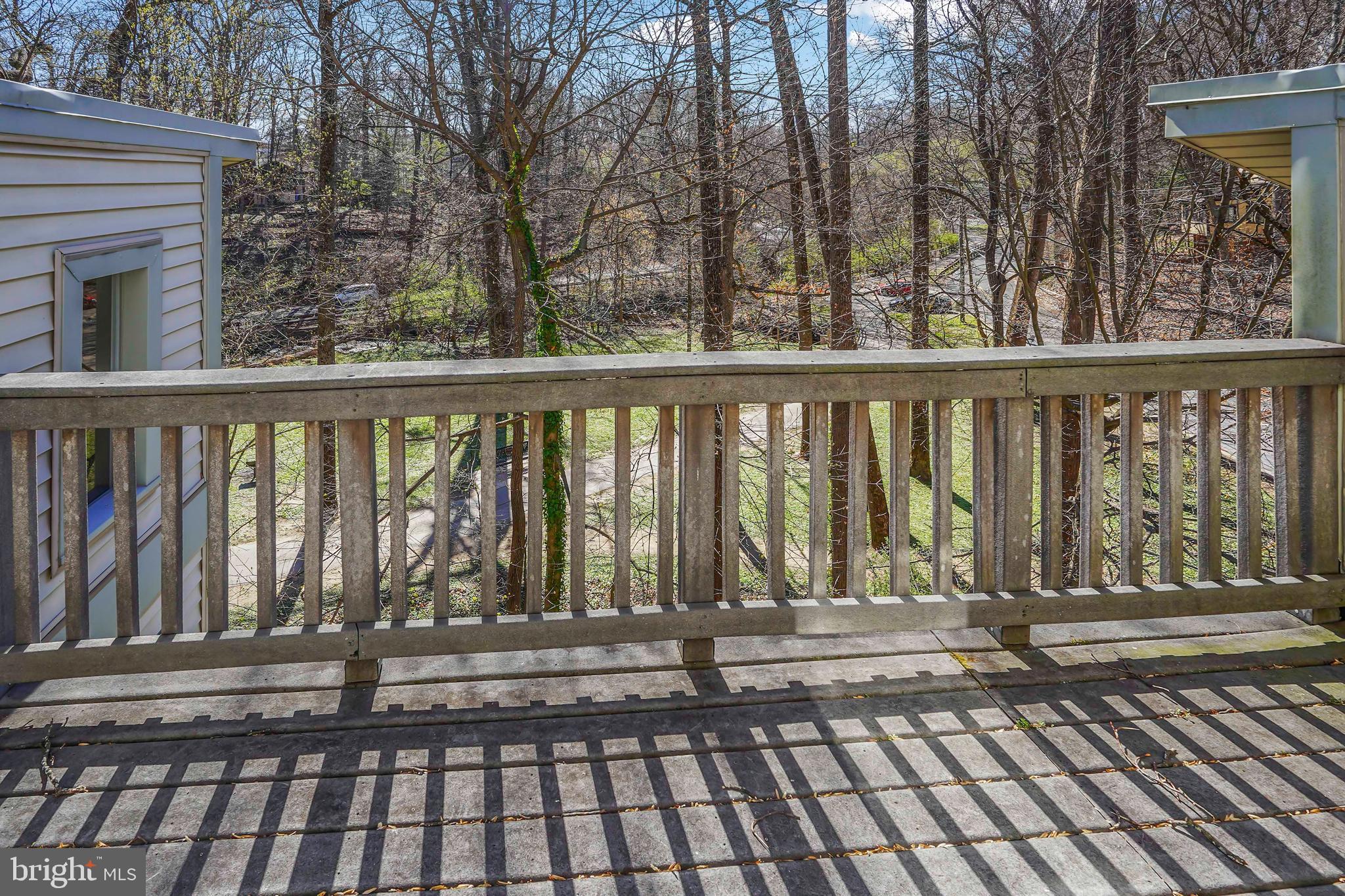 132 Hilltop Road Silver Spring, MD 20910 - Photo 37 of 50 a view of a balcony with wooden floor