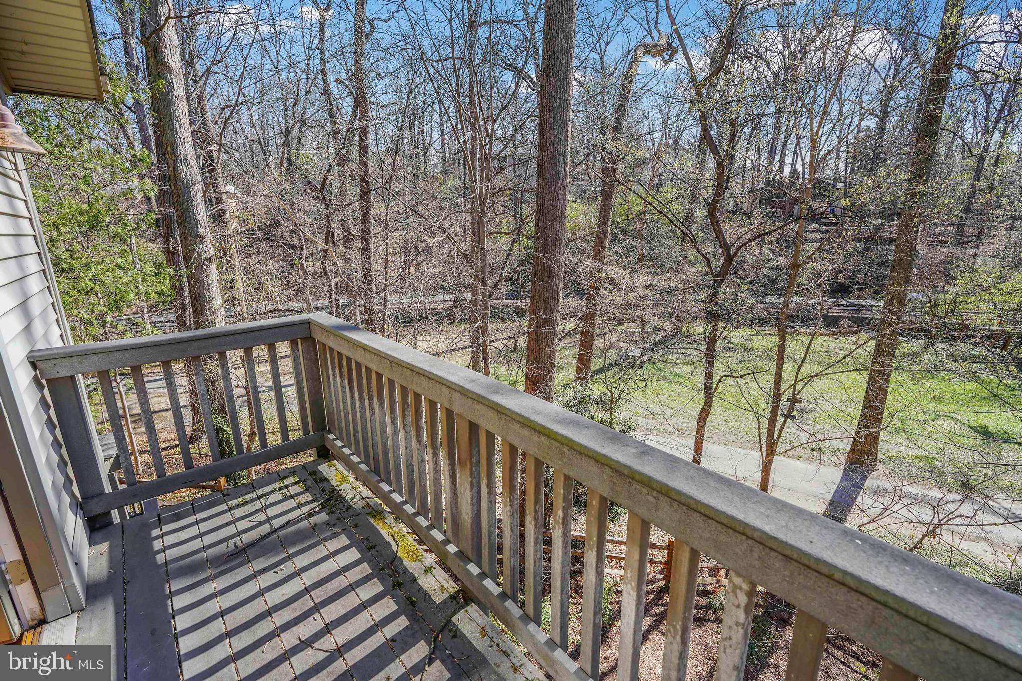 132 Hilltop Road Silver Spring, MD 20910 - Photo 38 of 50 a view of balcony with wooden floor and fence