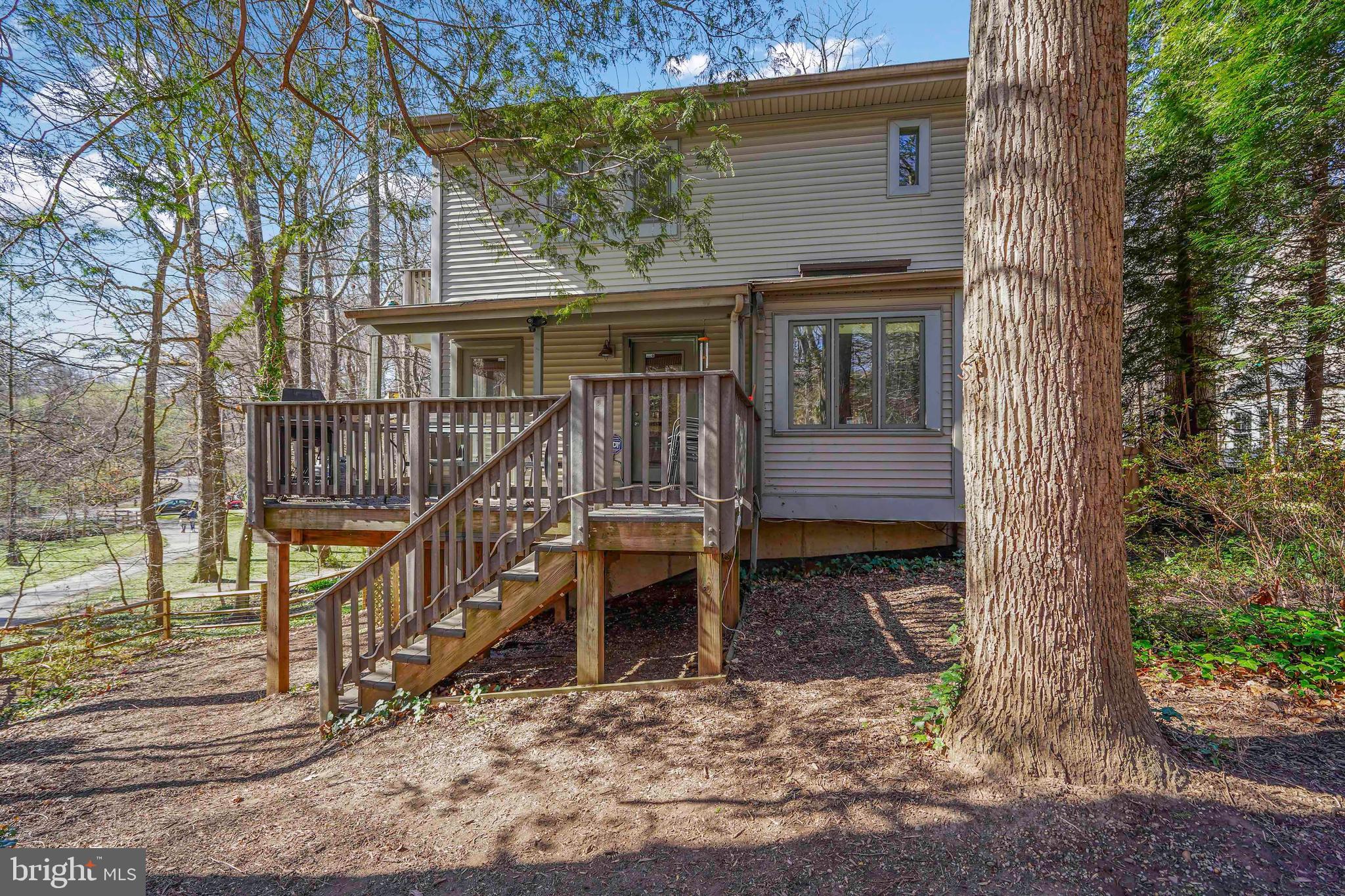 132 Hilltop Road Silver Spring, MD 20910 - Photo 40 of 50 a view of house with a small yard and wooden fence