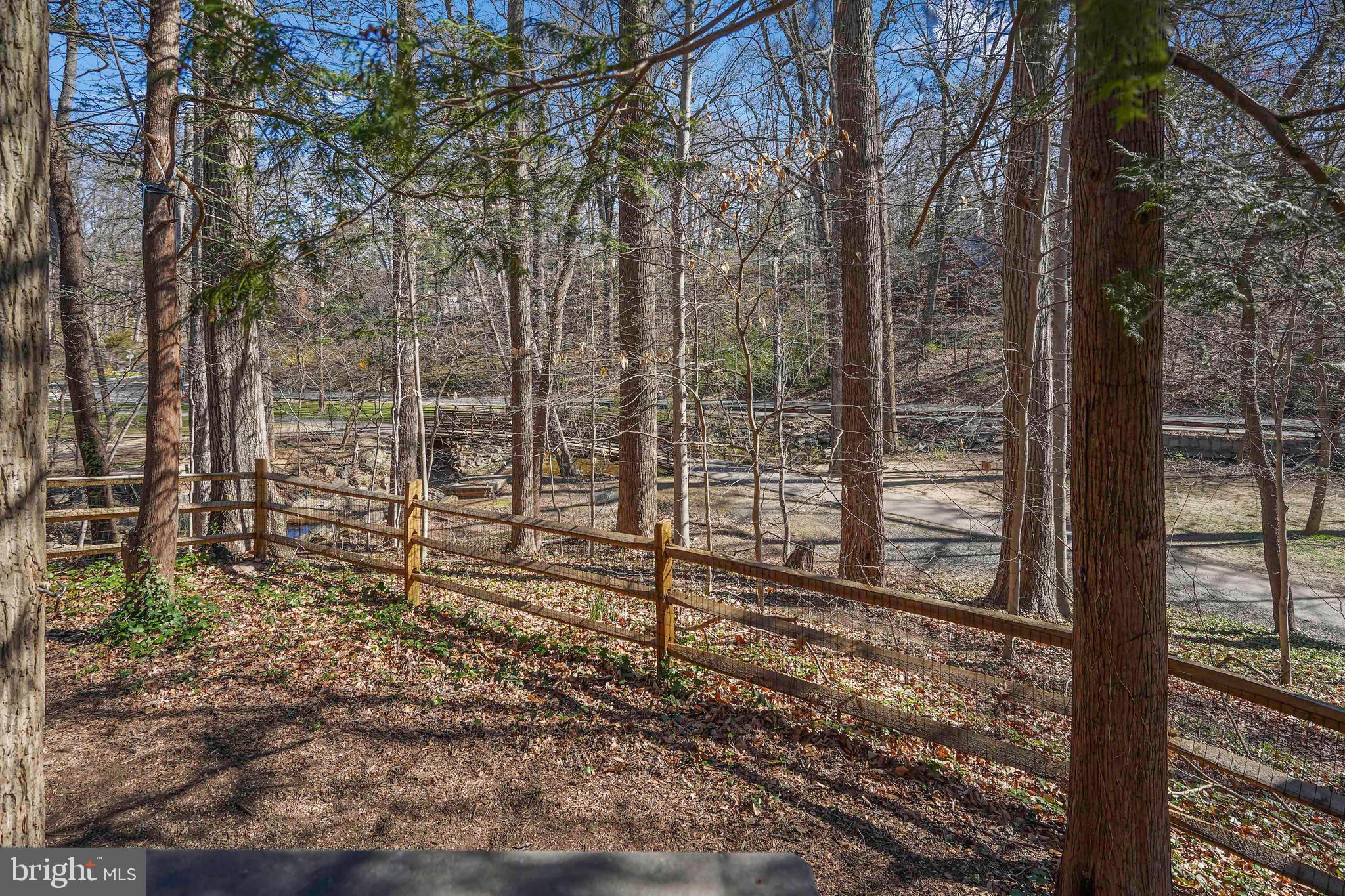 132 Hilltop Road Silver Spring, MD 20910 - Photo 46 of 50 a view of a wooden house with a large tree