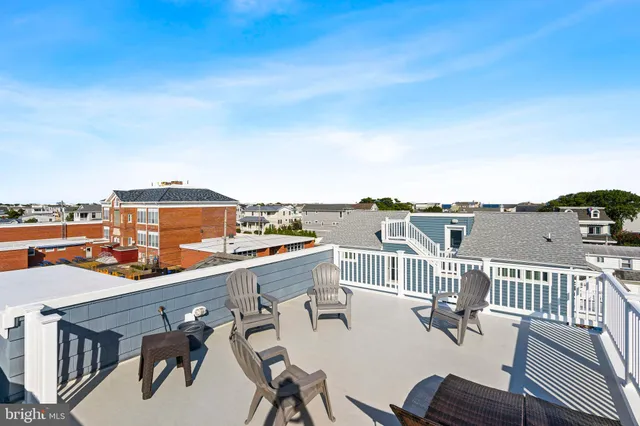a view of a terrace with seating area