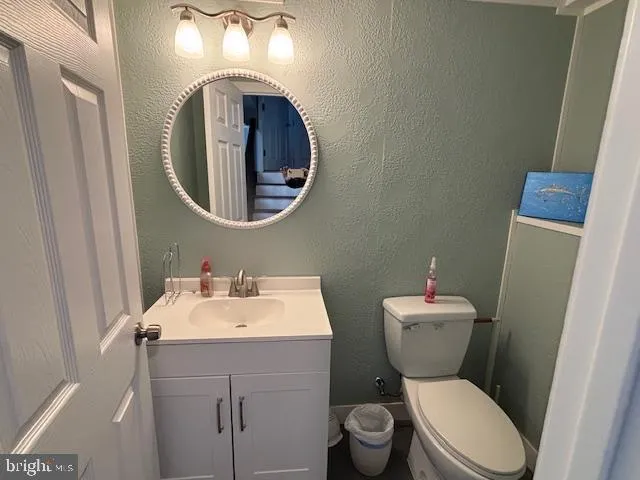 a view of a terrace with table and chairs