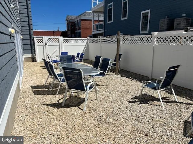a view of living room with furniture and a window