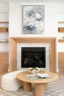 a view of a bedroom with a bed and a view of bathroom