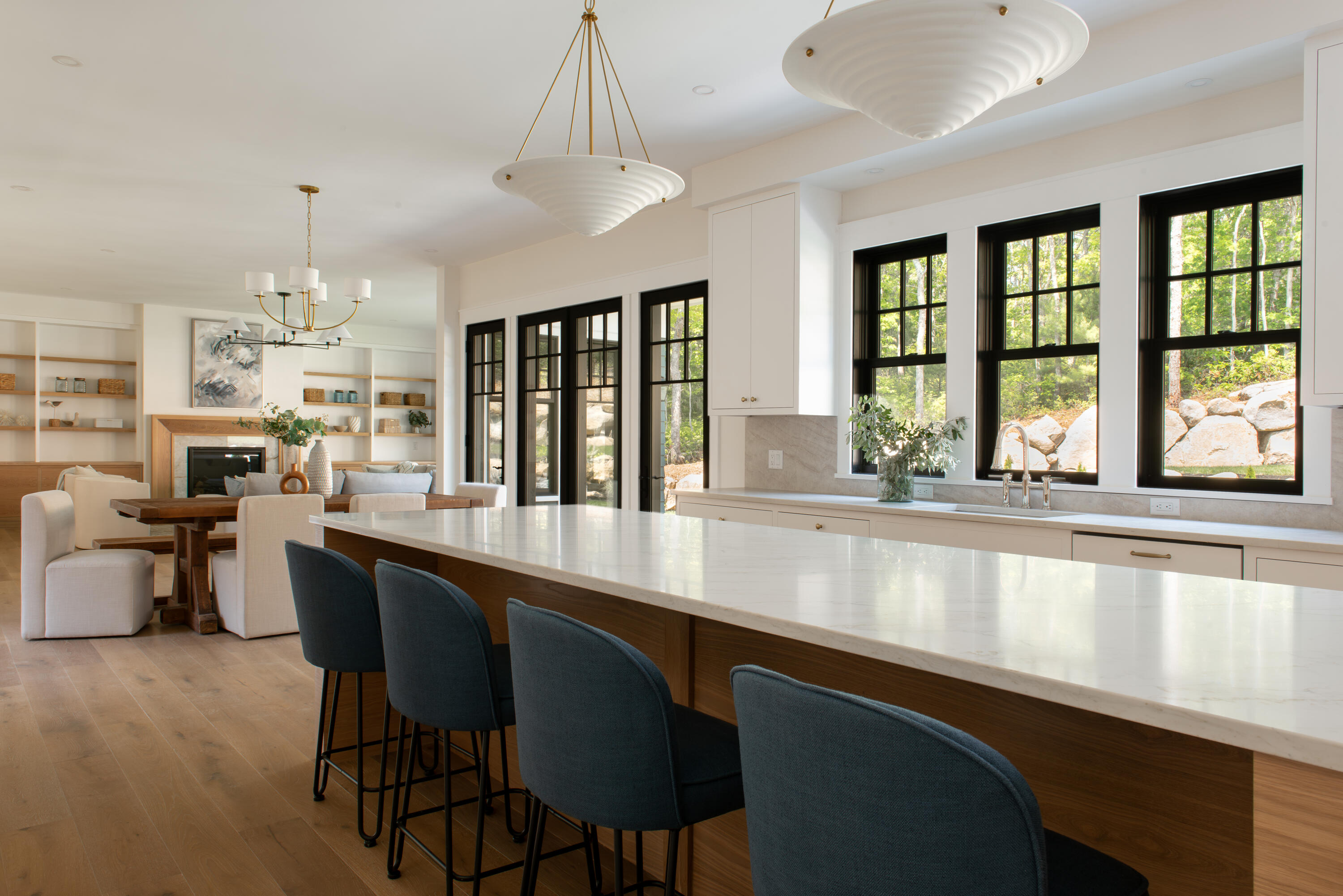 61 McKenna Ridge Drive East Falmouth, MA 02536 - Photo 15 of 44 a large kitchen with a table and chairs in it