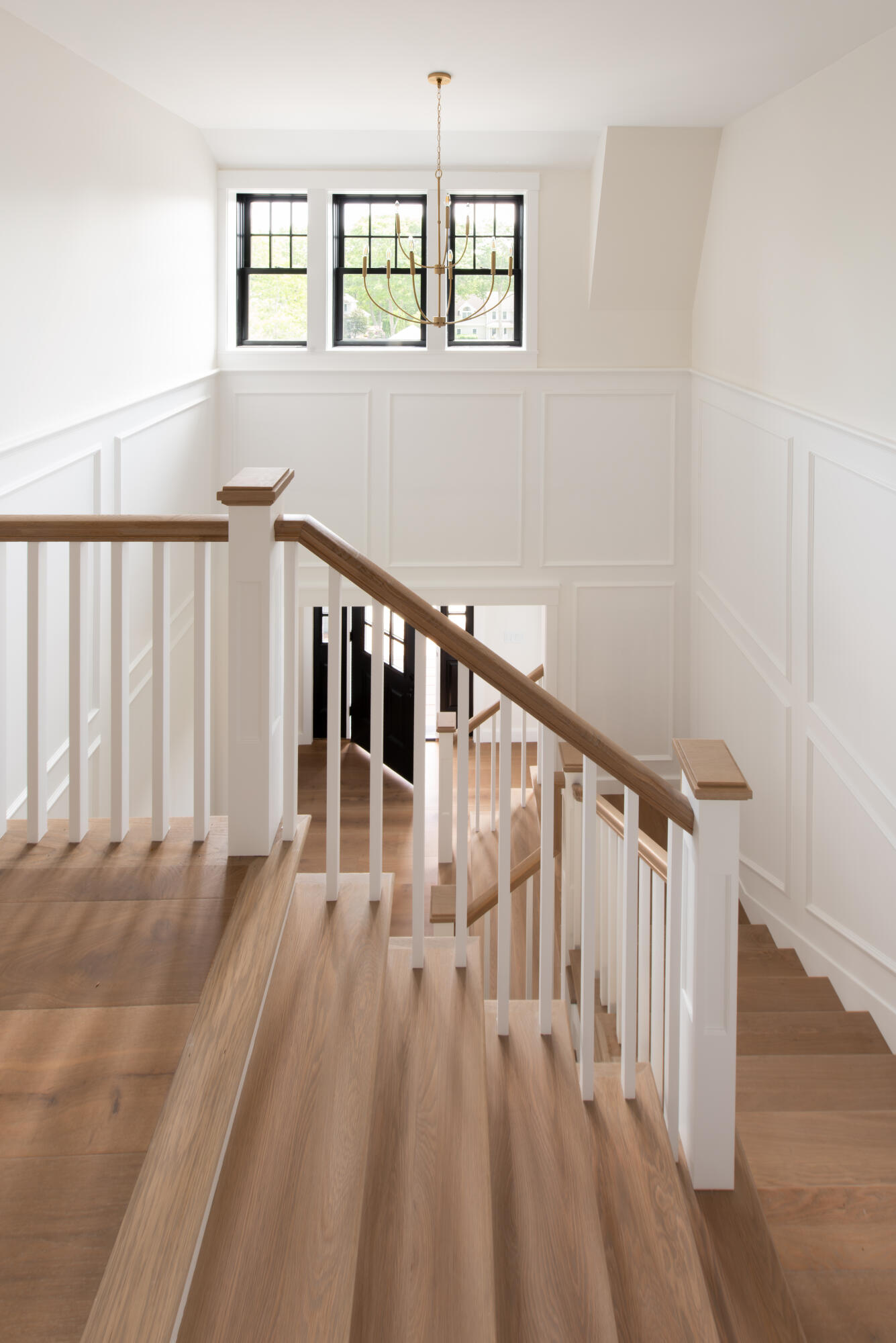 61 McKenna Ridge Drive East Falmouth, MA 02536 - Photo 30 of 44 a view of a hallway with wooden floor and staircase