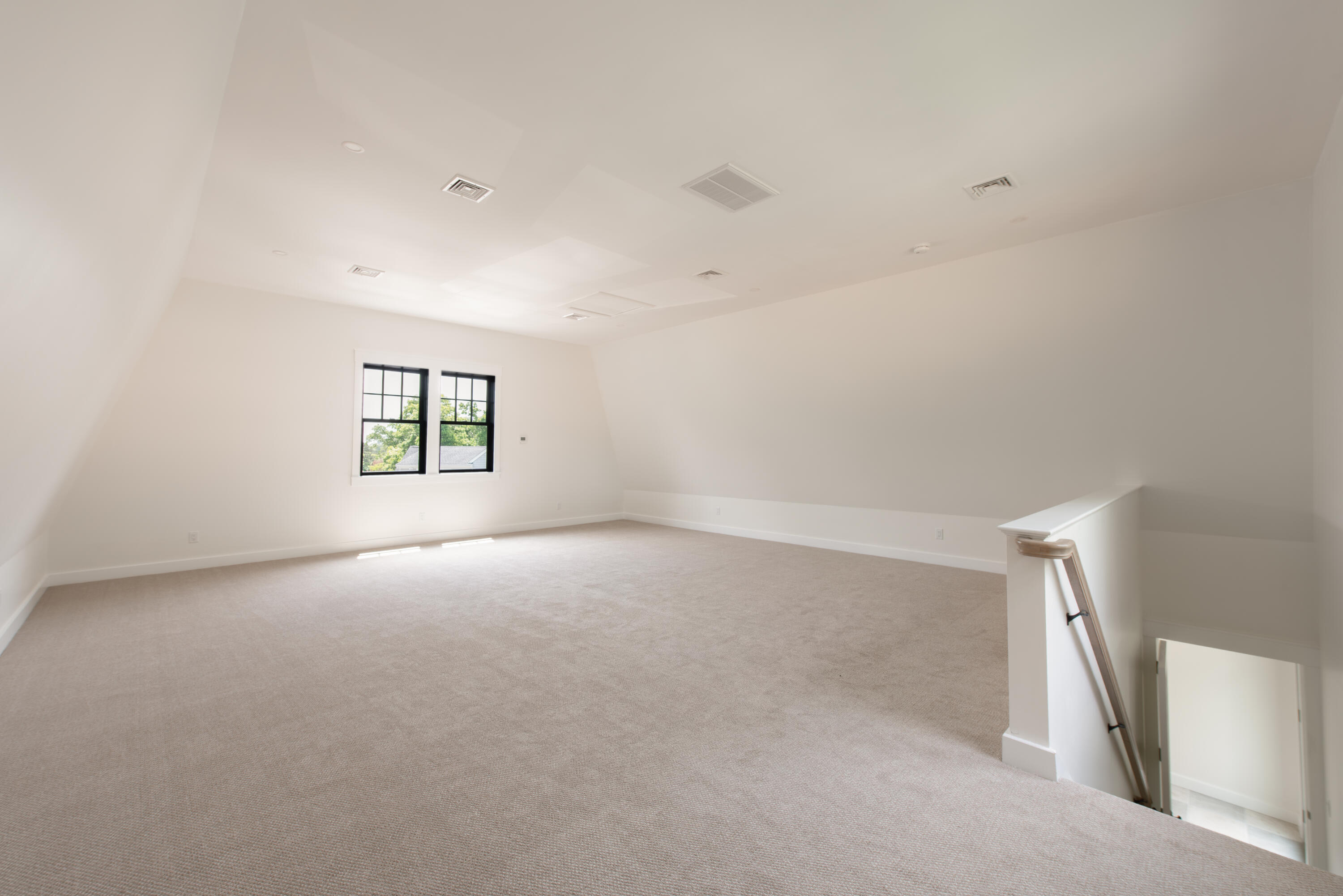 61 McKenna Ridge Drive East Falmouth, MA 02536 - Photo 33 of 44 an empty room with a empty space and windows