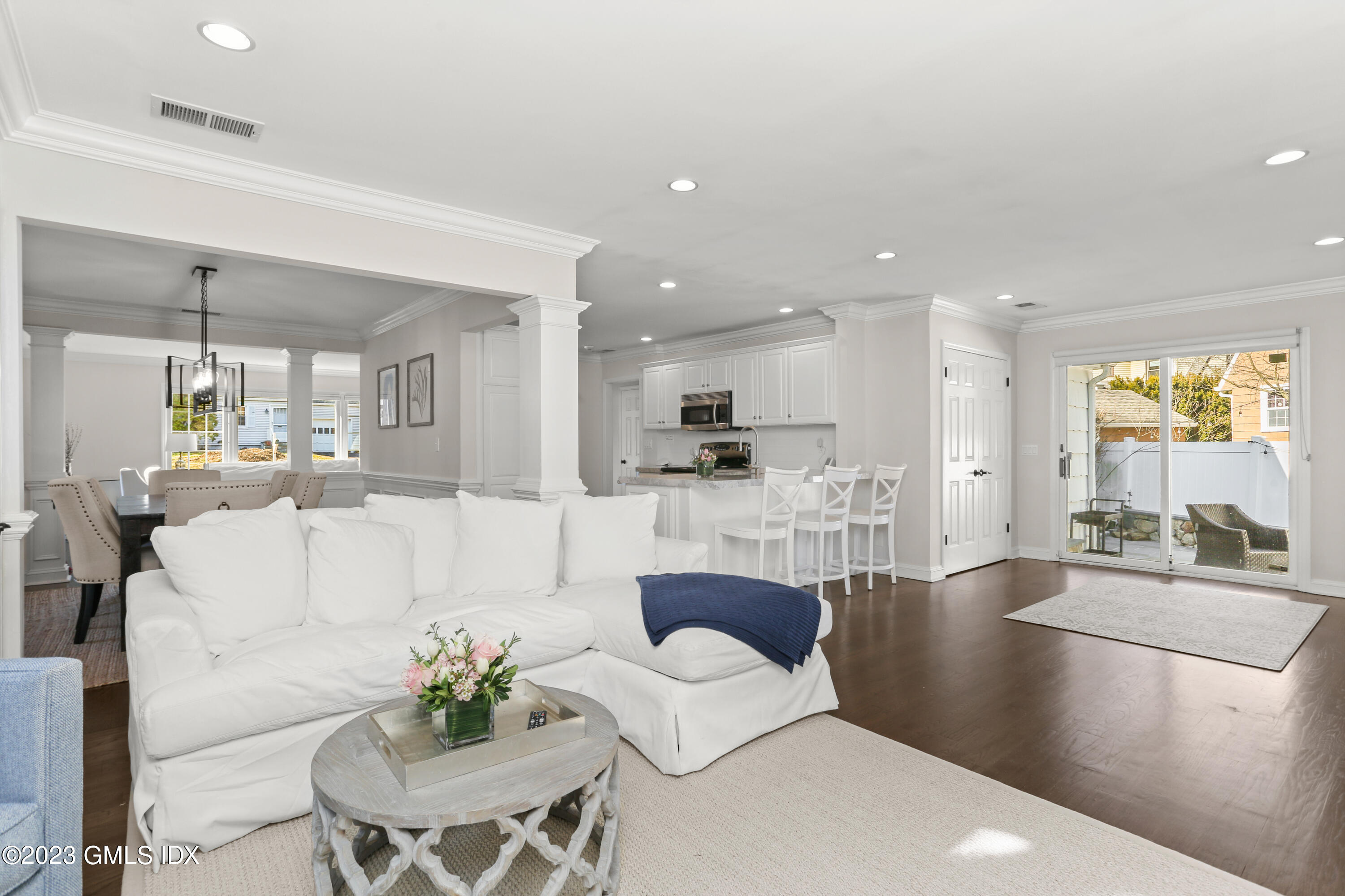 25 Manor Road Old Greenwich, CT 06870 - Photo 11 of 21 a living room with furniture and a large window