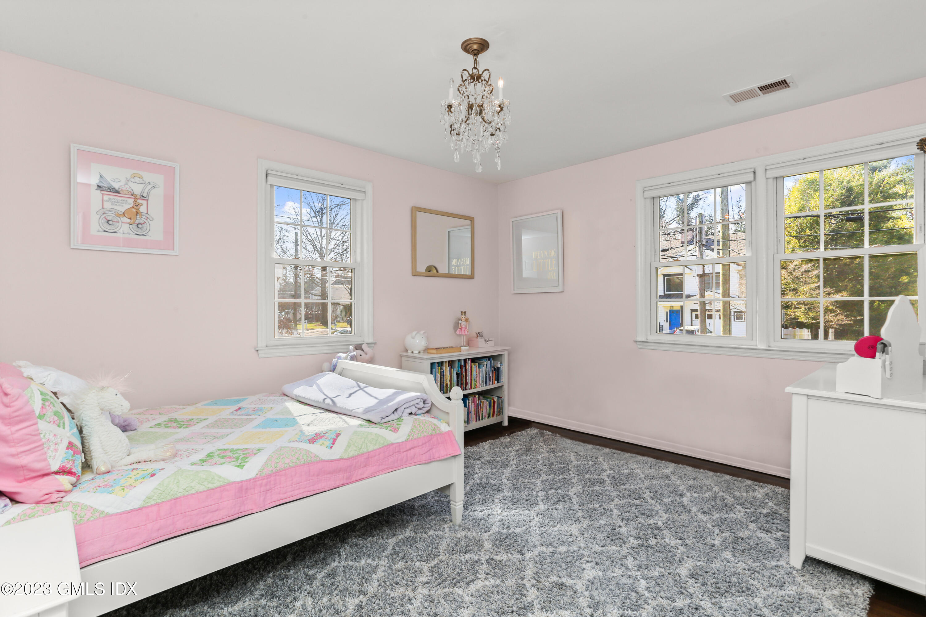25 Manor Road Old Greenwich, CT 06870 - Photo 14 of 21 a bedroom with a bed and a window