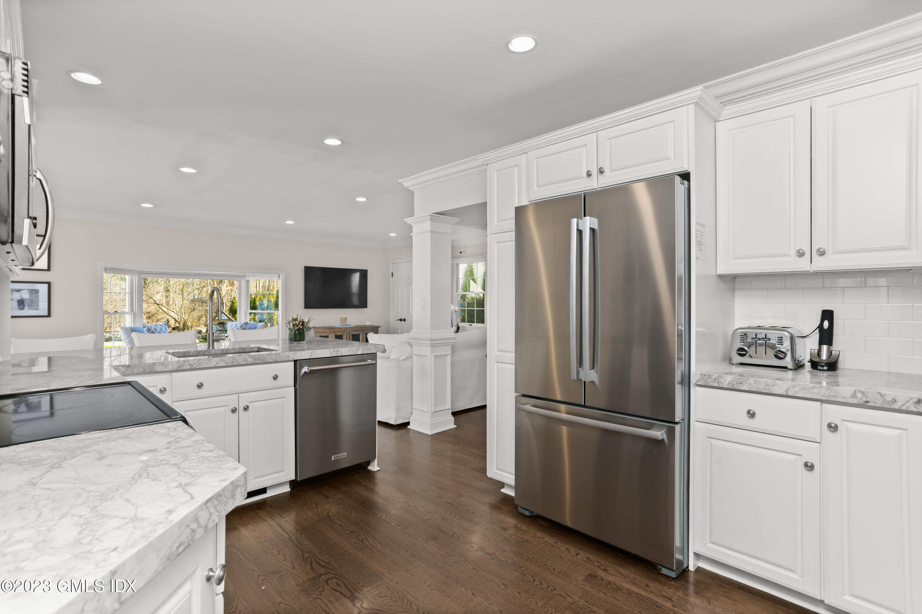 25 Manor Road Old Greenwich, CT 06870 - Photo 4 of 21 a kitchen with granite countertop a refrigerator stove and sink