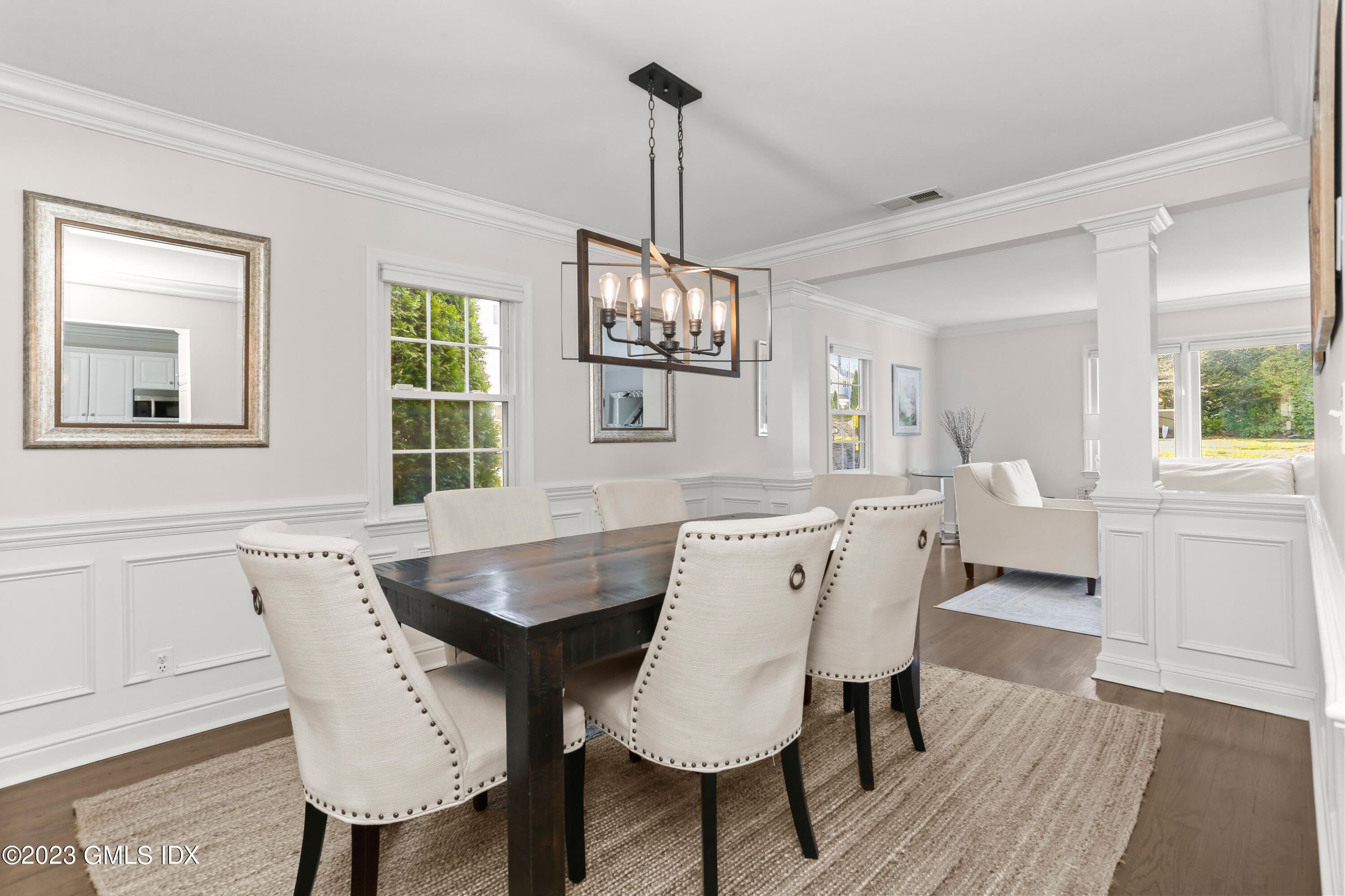 25 Manor Road Old Greenwich, CT 06870 - Photo 7 of 21 a view of a dining room with furniture window and wooden floor
