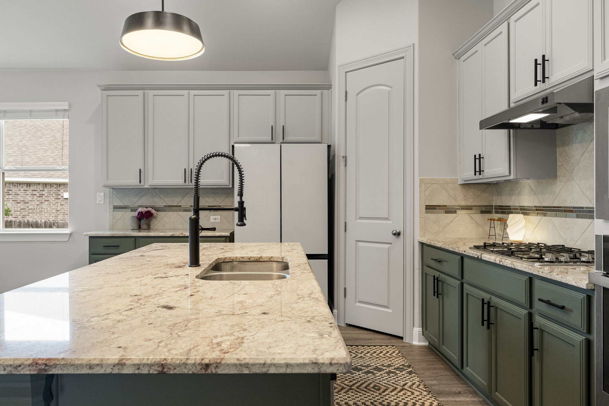 772 Founders Ridge Dripping Springs, TX 78620 - Photo 18 of 40 Stone counters and expansive prep areas make the kitchen ideal for both everyday living and
entertaining.
