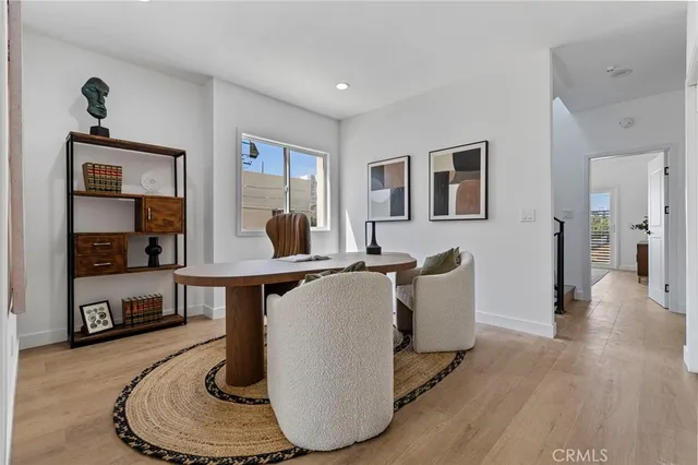 a living room with furniture and window