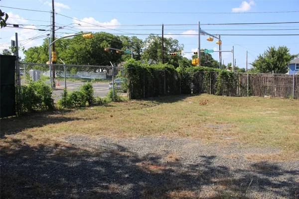 a view of a backyard of the house